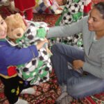 Airmen, Soldiers donate goods to Uzbek baby orphanage